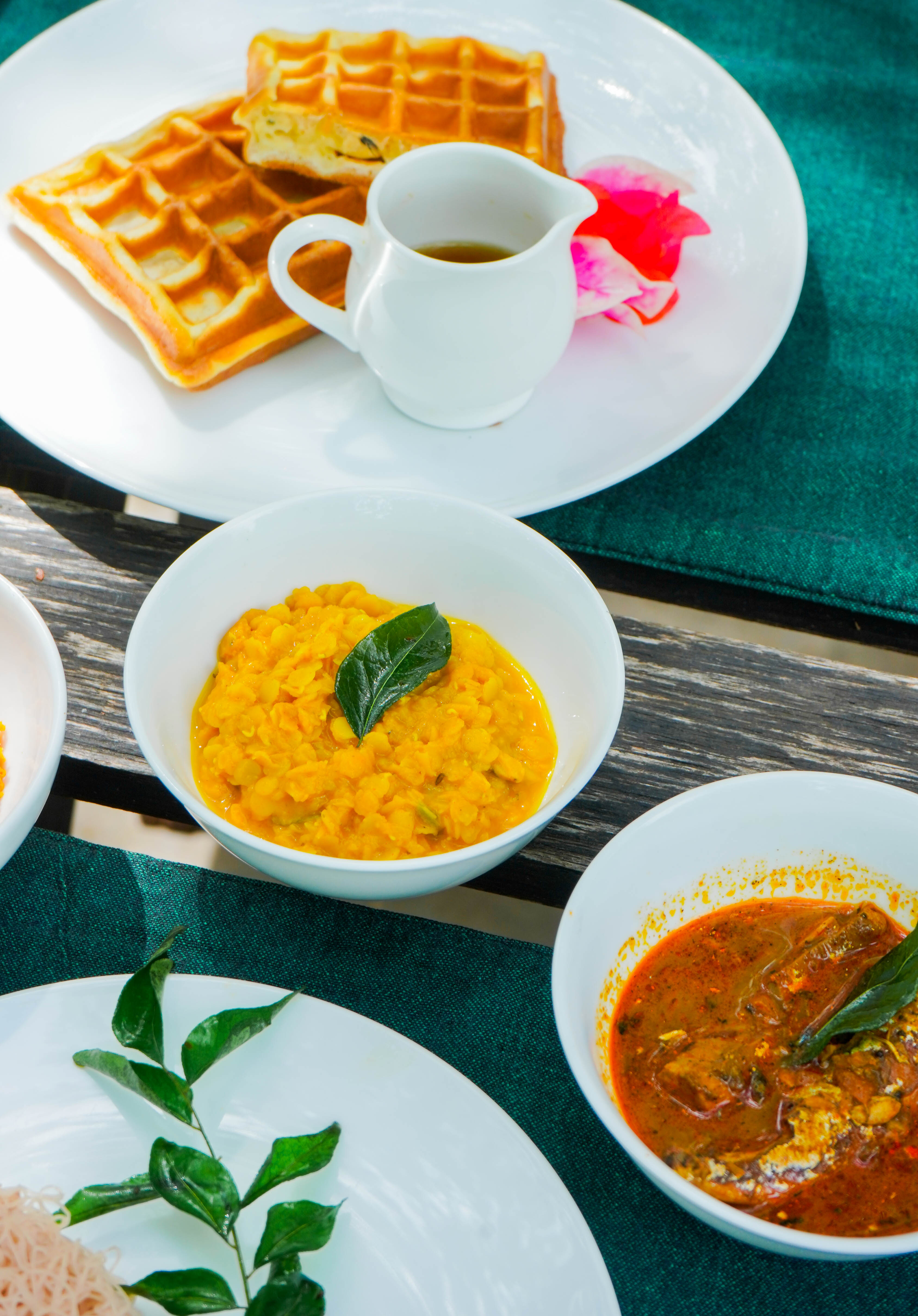 A Sri Lankan spread across the open kitchen pass at Arana