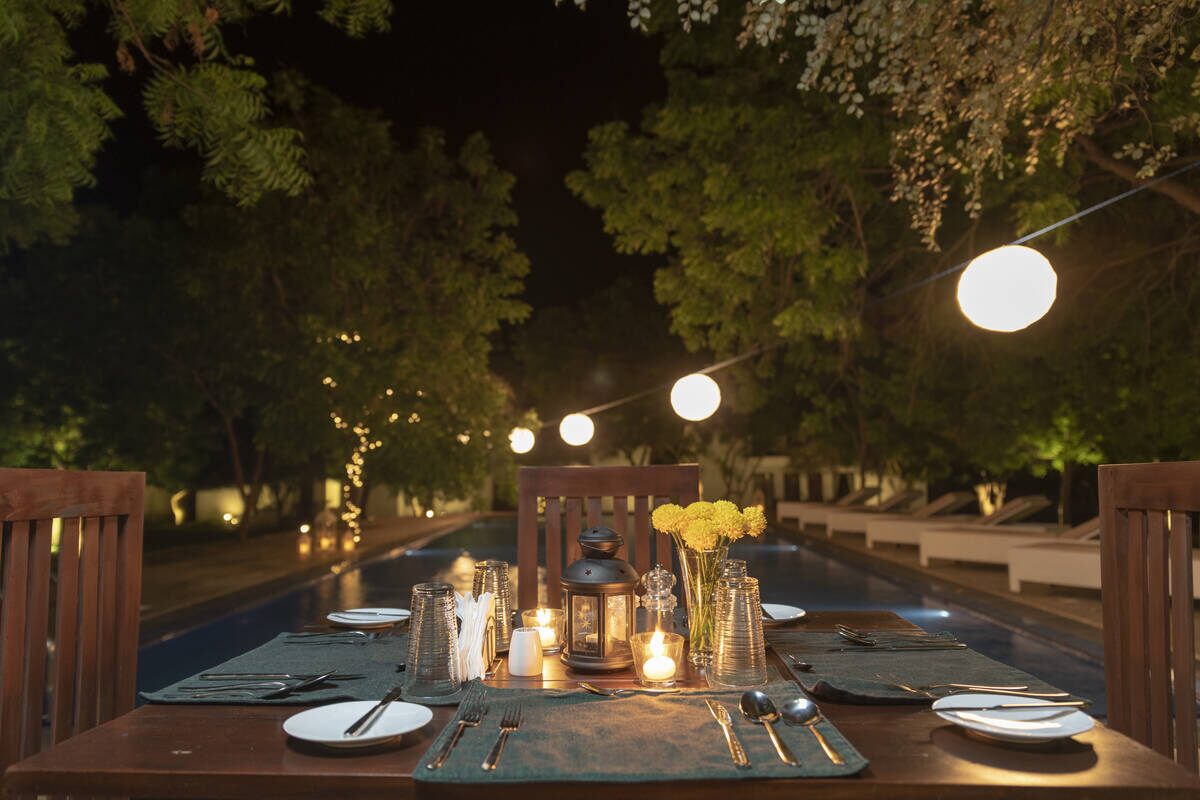 Outdoor dining setup under the neem at Arana near Yala