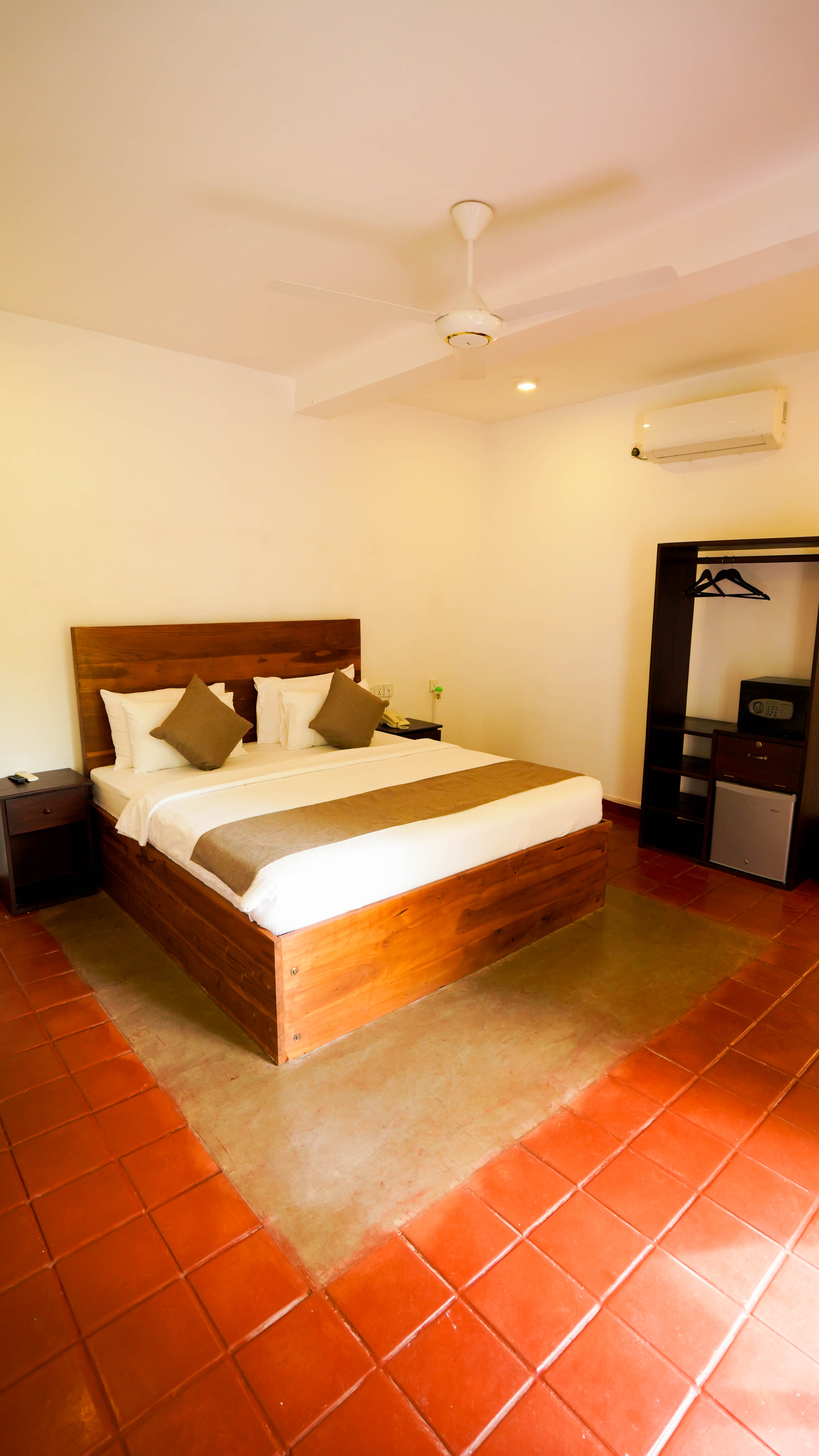 Interior of a Superior Room at Arana, with twin beds and a garden view