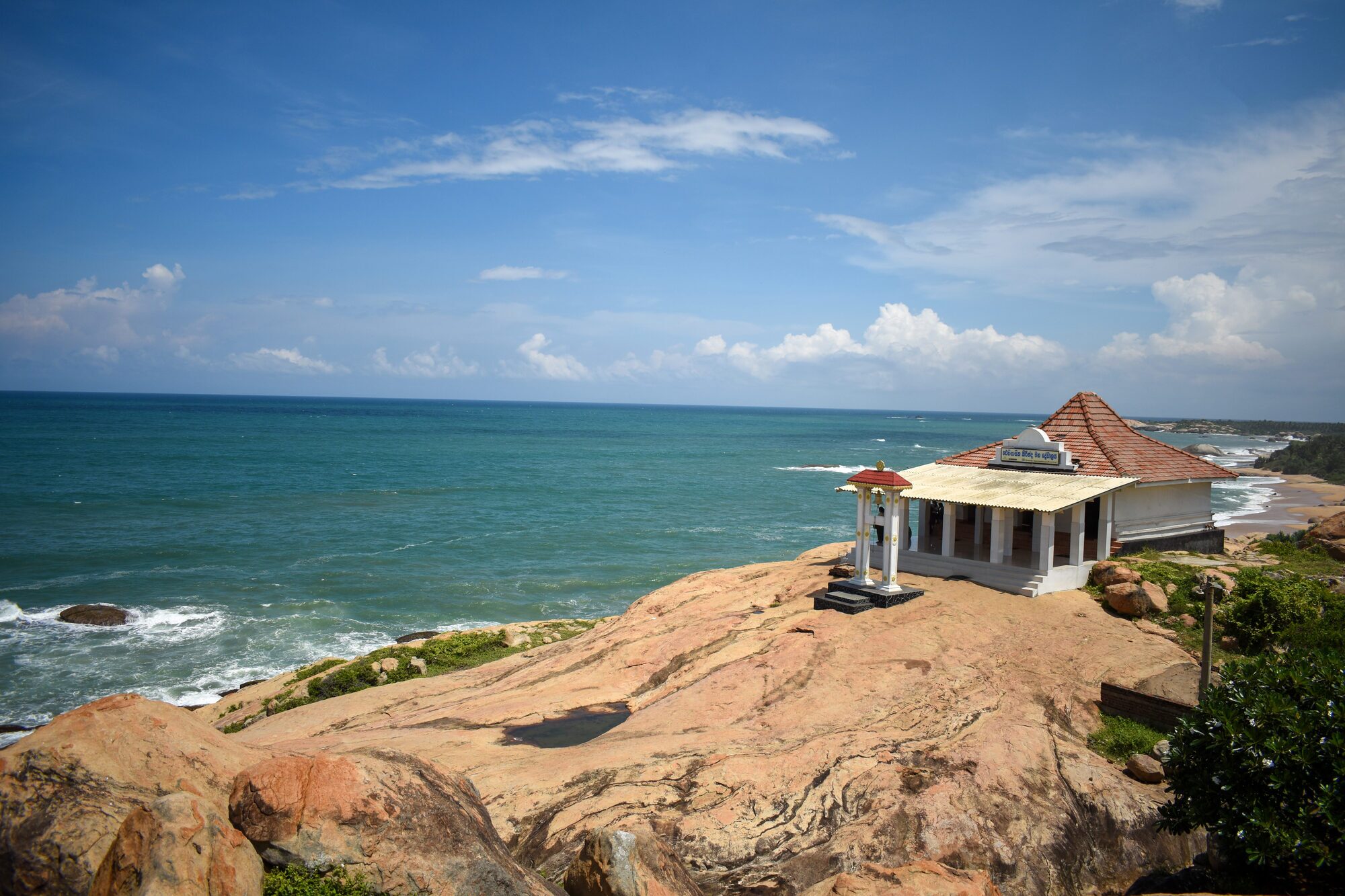Kirinda temple on a rocky headland above the Indian Ocean near Yala, southern Sri Lanka